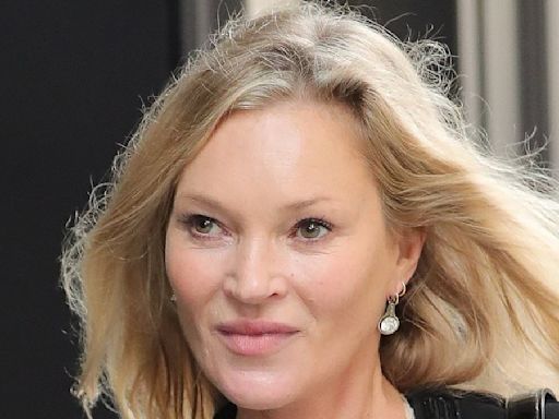 Kate Moss beams in a thin floral dress as she leaves the Ritz Paris