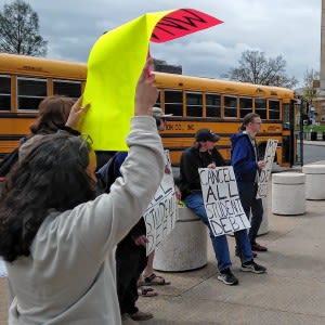 Debt-burdened students, grads rally for relief