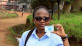 Smudged ID cards, missing names blemish Congo's $1 billion election
