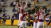 WATCH: Alabama linemen push car through mall for good cause