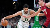 Jayson Tatum triple-double, 3s lead Celtics past Butler-less Heat 114-94 in playoff opener