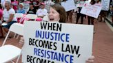 Abortion-rights protesters rally in front of Old State Capitol in Springfield