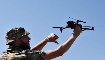 Ukraine just showed its low-cost, lightweight drones can destroy a Russian helicopter, Russian sources say