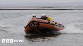 Man and a dog found treading water after tidal cut-off