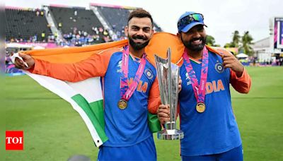 Watch: Virat Kohli and Rohit Sharma celebrate with India flag after T20 World Cup title victory against South Africa | Cricket News - Times of India