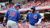 Happ launches 2-run homer and Cubs pound out 17 hits in 13-4 rout of Reds