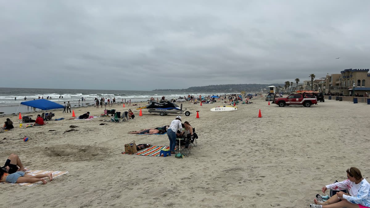 Beachgoers hit Mission Beach for Memorial Day despite May gray