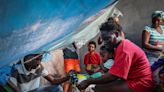 Photos: As UN-backed forces arrive, Haitians wait for normality to return