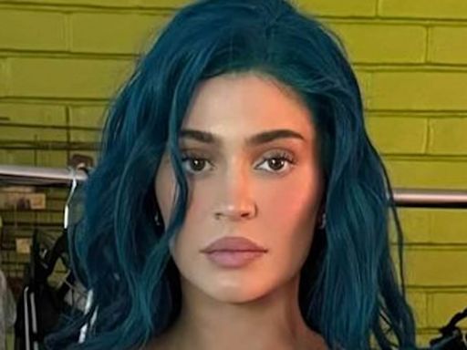 Blue-haired Kylie Jenner flashes abs in a tiny white tank top