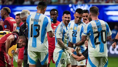 Messi and Argentina overcome Canada and poor surface, start Copa America title defense with 2-0 win