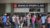 Cash demand soars in Puerto Rico after hurricane hit ATMs, card systems