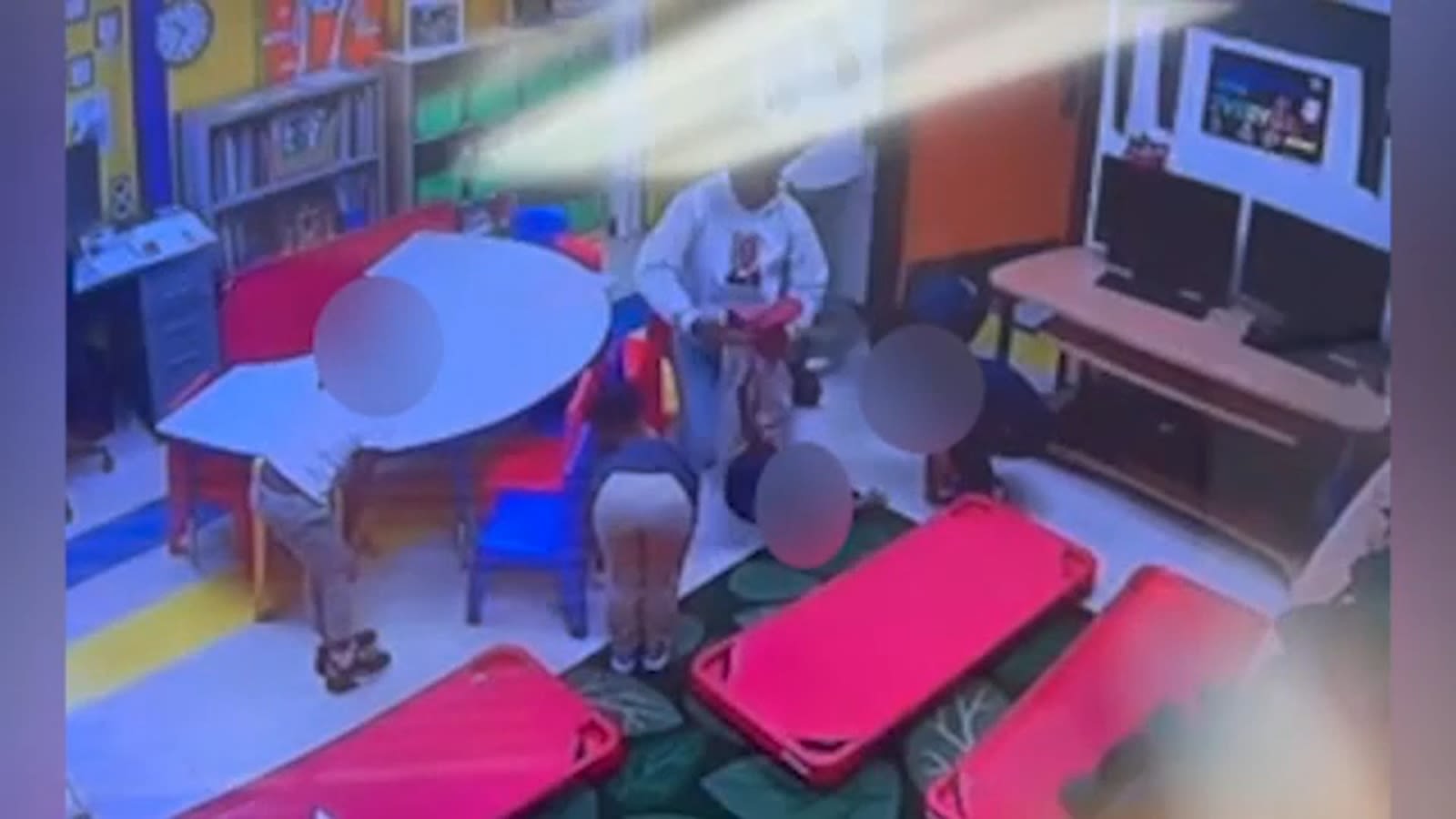 Video shows woman at LA preschool grabbing 4-year-old boy by ankles, carrying him upside down