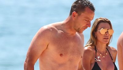 John Terry's wife Toni, 43, shows off her figure in a black bikini