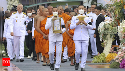 Small town in Thailand hold mass cremation for 23 who died in a school trip bus fire - Times of India