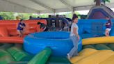 Inflatable fun: Wildcat Mentors celebrate with end-of-year bash