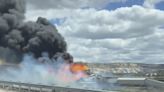 Freight train derailment, fire forces Interstate 40 closure near Arizona-New Mexico line