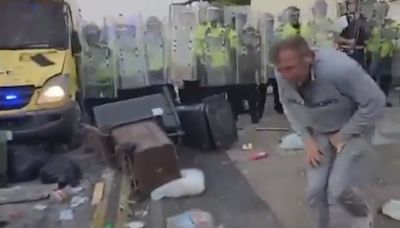 Watch: Southport demonstrator hit by brick