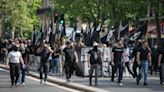 Chaos in Paris as almost 1000 masked neo-nazis terrify locals with huge march