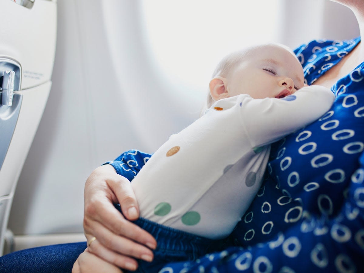 Mother with baby defended after refusing to return to original seat on plane