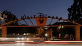 Disney reports shrinking TV business, shares tumble