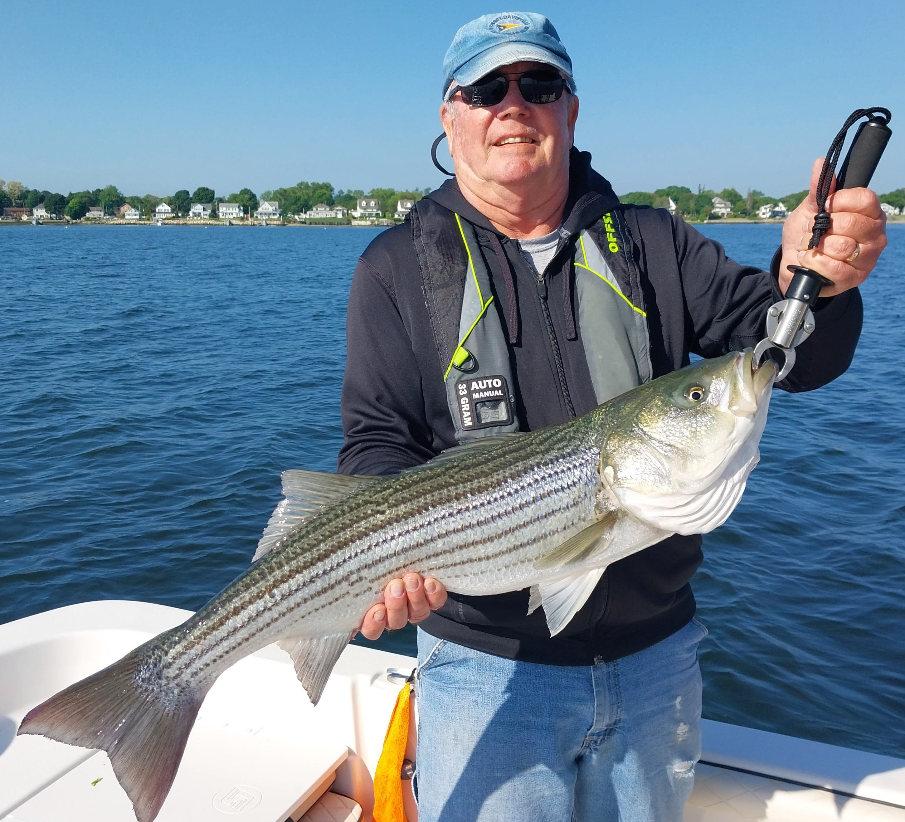 Fishing for striped bass? Here's how to catch them this time of year in RI waters