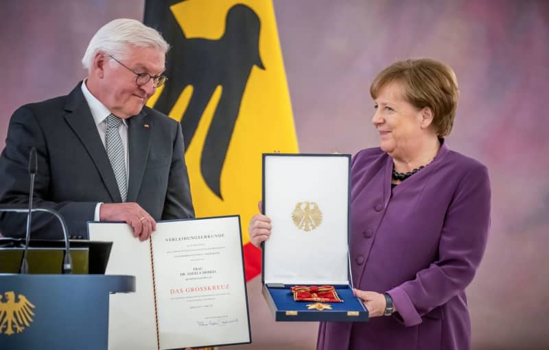 Merkel, turning 70, honoured as 'hallmark of democracy' by president
