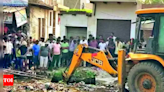 Drunk man escapes via drain, cops bring bulldozer to scoop him out | Agra News - Times of India