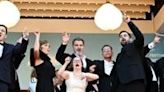 The cast of 'A Little Something Extra' celebrate at the Cannes Film Festival