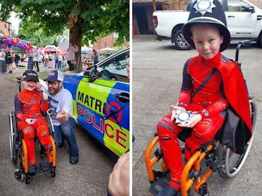 Police help boy who is battling cancer to mark superhero day in heart-warming gesture