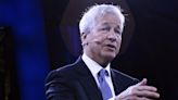 Jamie Dimon says the Fed should hold off on rate cuts as its credibility 'is a little bit at stake'