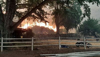 Wildfires prompt California evacuations as crews battle Oregon and Idaho fires stoked by lightning