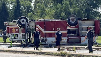 Officials: 4 firefighters taken to hospital after fire truck overturns on Indy's east side