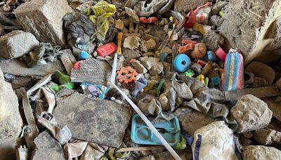 Children's toys in rubble of deadly apartment block strike in Lebanon