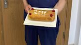 Doctor celebrates 2000th vasectomy with a sperm-themed cake
