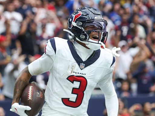 Tank Dell of the Houston Texans appears to be unaffected by a gunshot injury