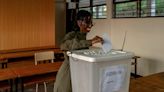 Rwandans vote 'smoothly' in election; Kagame in early lead