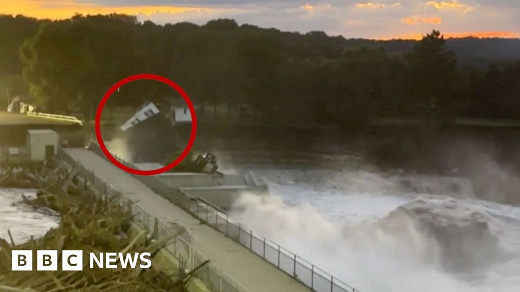 Moment home tumbles into river as dam fails in Minnesota