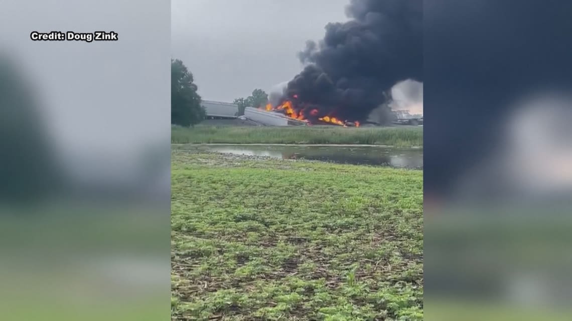 Rail cars carrying hazardous material derail and catch fire in North Dakota