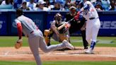 Shohei Ohtani delivers a walk-off single in the 10th inning of the Dodgers' 3-2 win over Cincinnati
