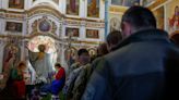 Ukrainians in embattled east mark third Easter under fire