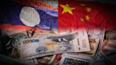 Laos central bank shake-up reveals forex crisis, China dependence