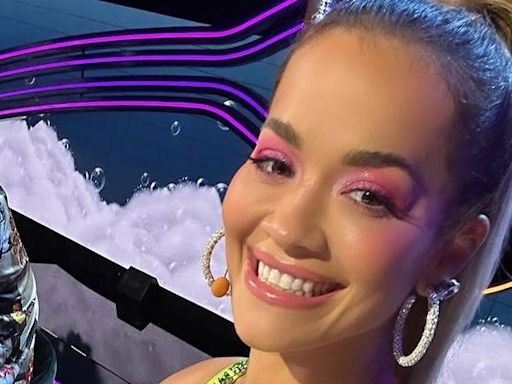 Rita Ora wears ‘60s bridal fit with platform boots that could kill a man