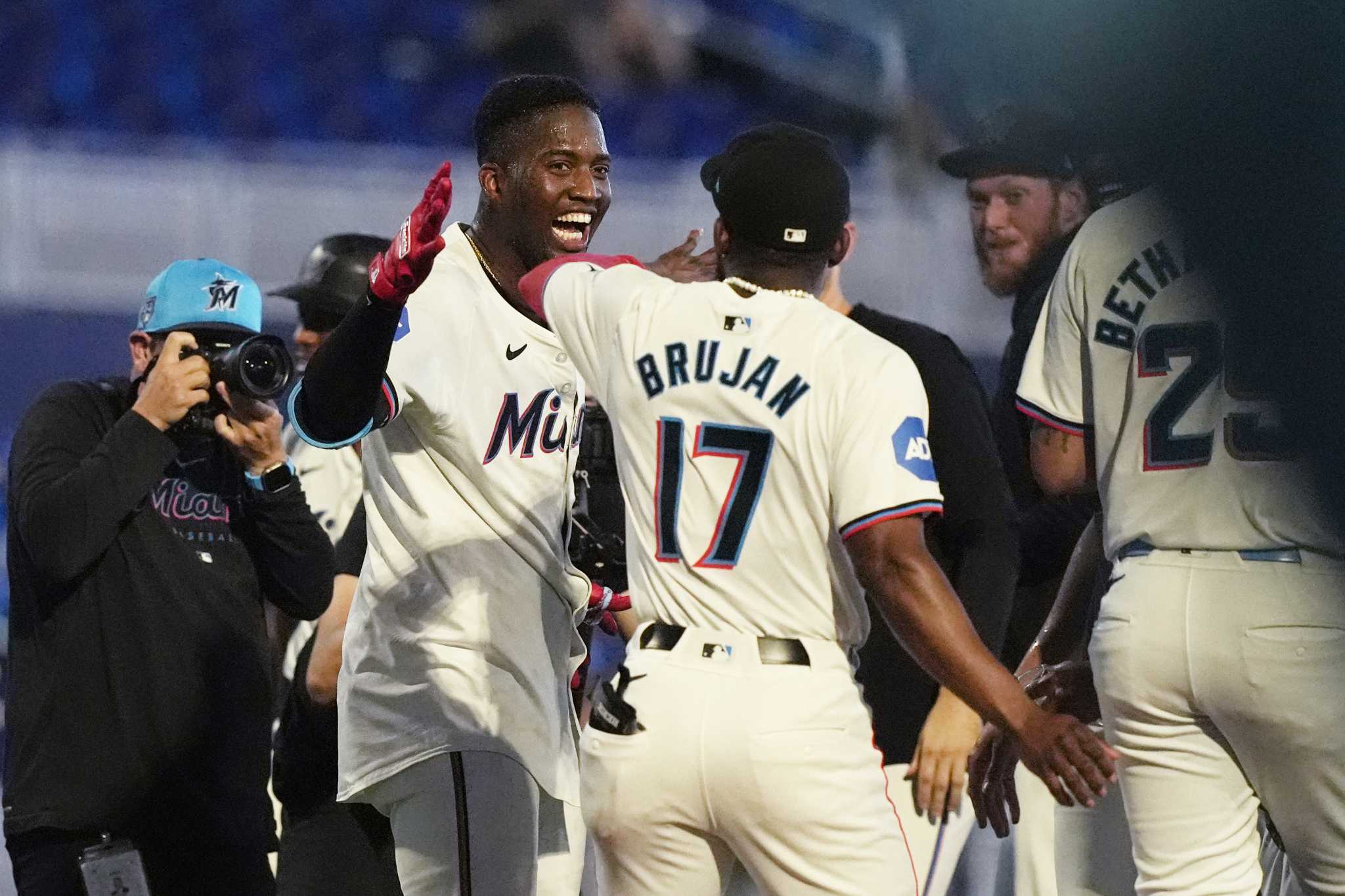 Marlins slip past Rockies 5-4 in 10 innings to cap three-game series sweep