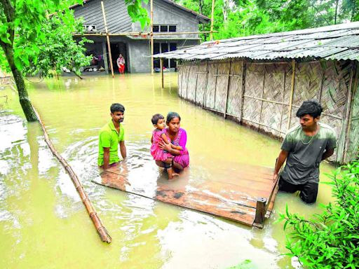 Floods and landslides triggered by heavy rains in northeast kill at least 16 people