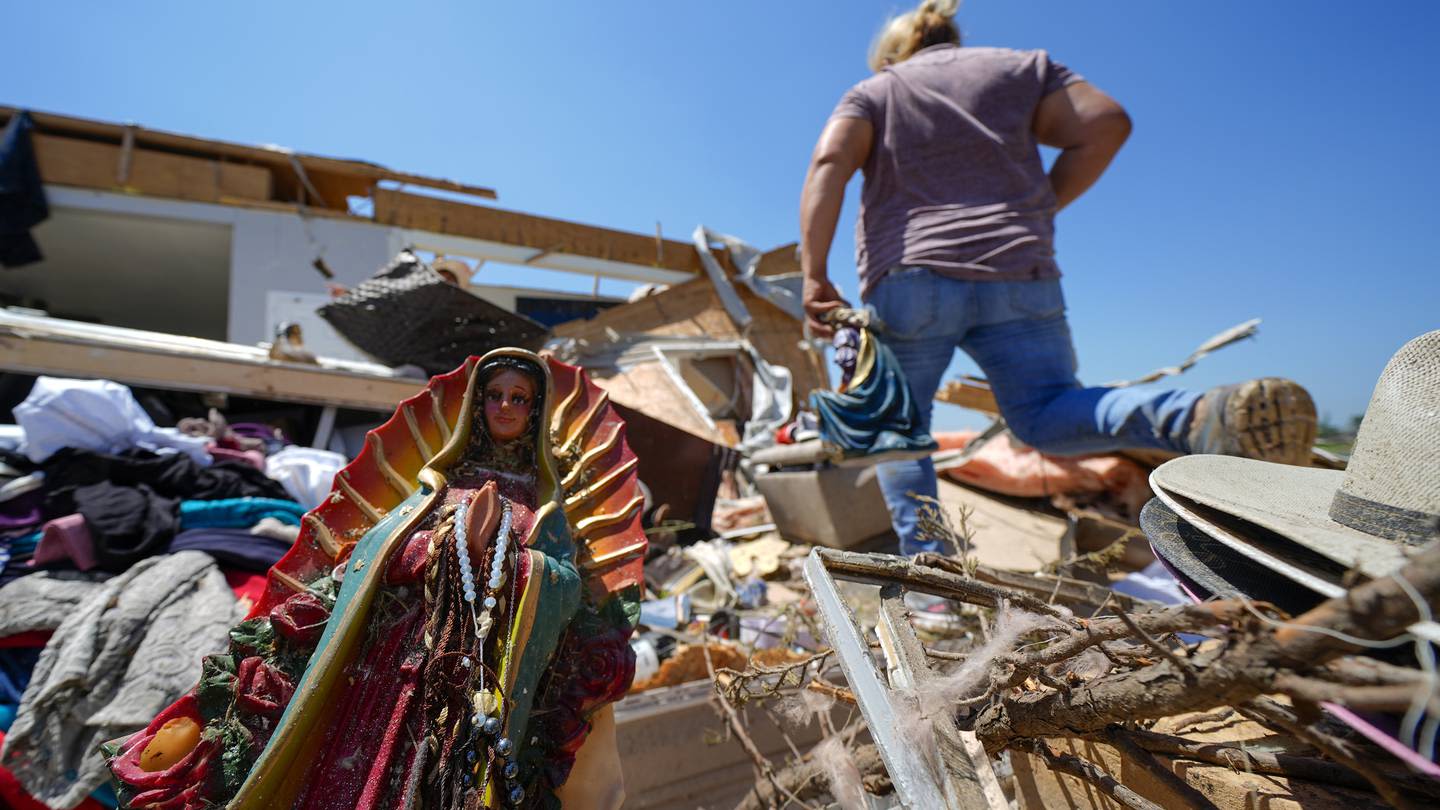 In a north Texas county, dazed residents sift through homes mangled by a tornado