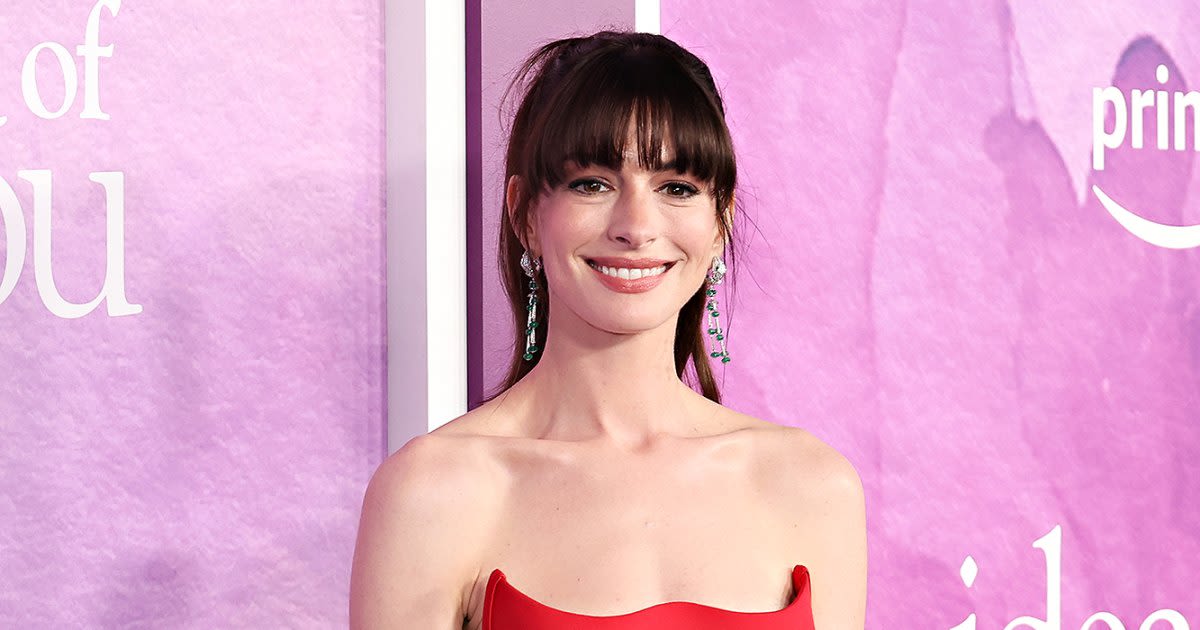 Anne Hathaway, Son Handed Out Snacks to Taylor Swift Fans in Germany