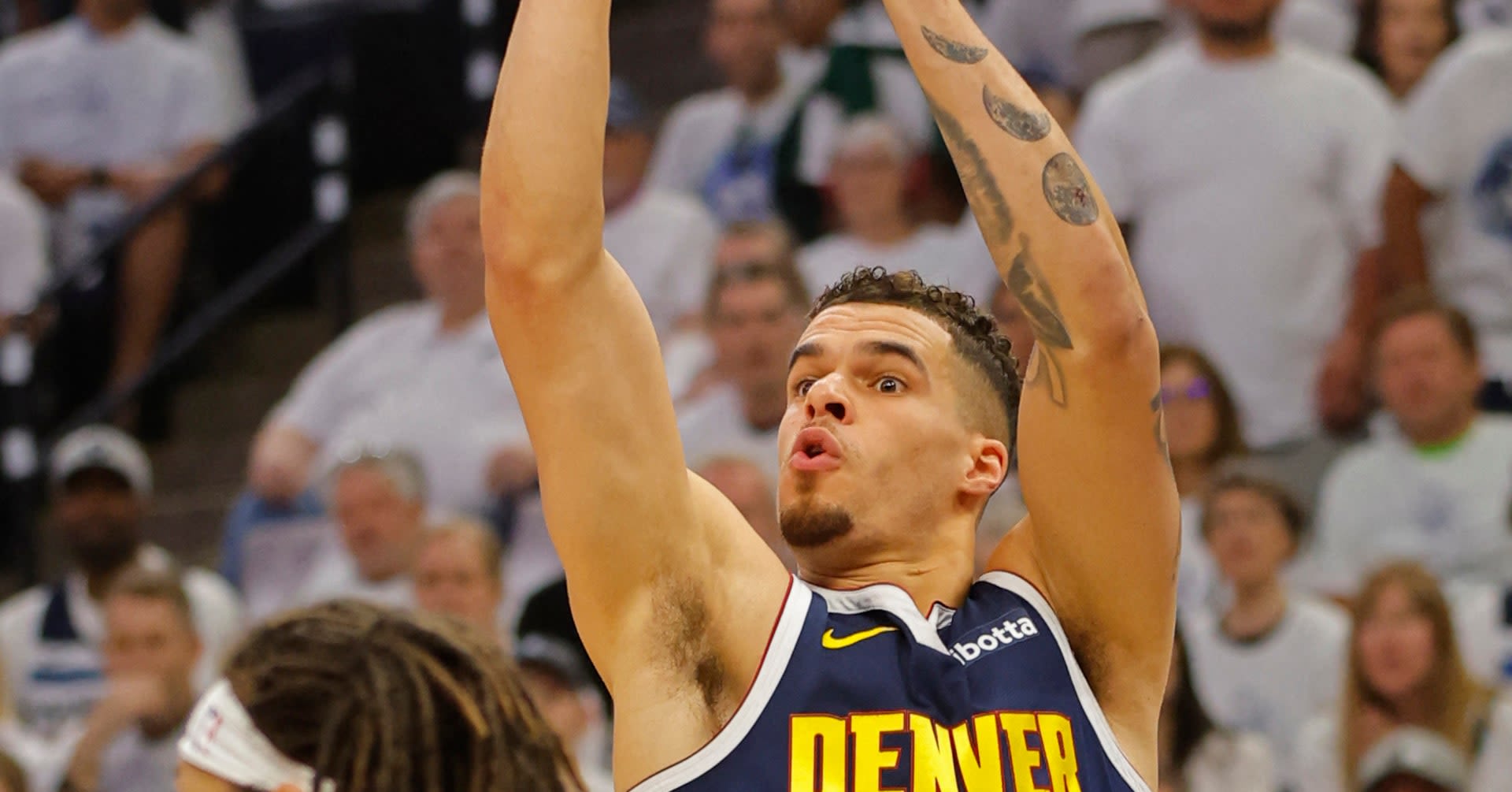 Road team wins again as Nuggets knock off Wolves, tie series