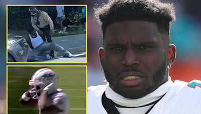 Hill scores Dolphins TD with 'handcuff' celebration hours after being detained