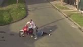 SMH: Mugger In Argentina Attempts To Speed Off On His Scooter While The Victim's Hair Is Caught In The Tire!