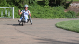 Overcoming limitations: Paralyzed shooting survivor to compete in Flying Pig hand cycling races